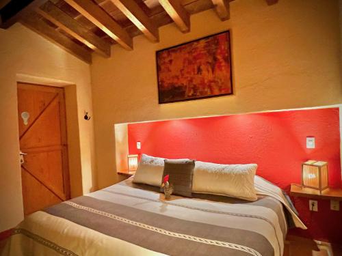 Las Luciernagas Bed and Breakfast Adults Onlyにあるベッド