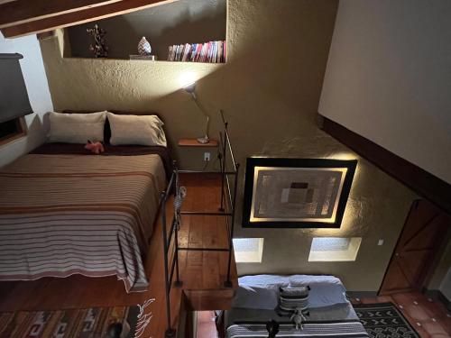 Las Luciernagas Bed and Breakfast Adults Onlyにあるベッド