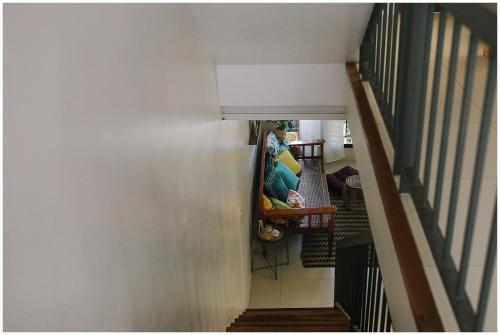 an attic hallway with a stairway with a room with at Hooga Home in Cebu City