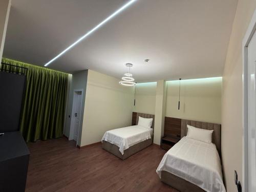 Una cama o camas en una habitación de Hotel Muja