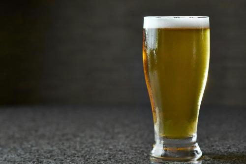a glass of beer sitting on a table at Montgomery Marriott Prattville Hotel & Conf Ctr at Capitol Hill in Prattville