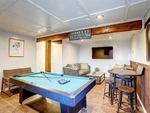 a living room with a pool table in it at Haven View Retreat in White Haven