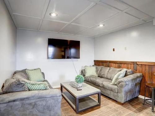 a living room with two couches and a table at Haven View Retreat in White Haven