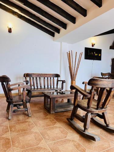 Una televisión o centro de entretenimiento en Posada Refugio Colonial