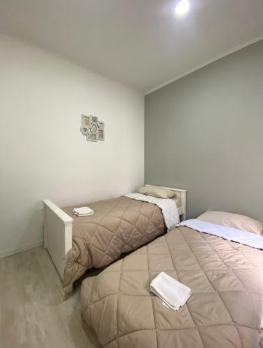 two beds in a small room with at Casa de Marianela in Chajarí