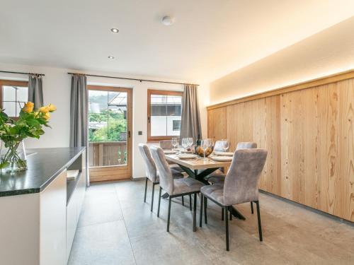 a dining room with a table and chairs at Appartement Dörler in Kirchberg in Tirol