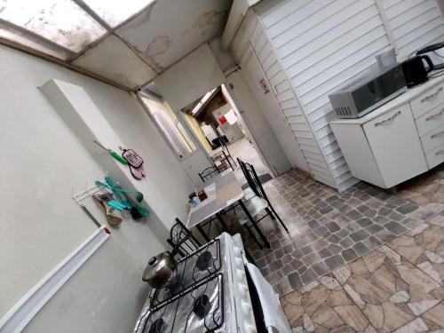 an overhead view of a kitchen with a stove at Patagonia Mágica in Punta Arenas