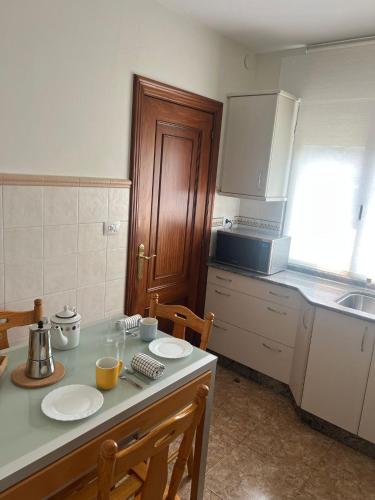 Η κουζίνα ή μικρή κουζίνα στο Casa das Pasadiñas-Burela