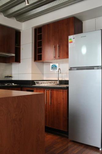 Kuchyň nebo kuchyňský kout v ubytování Loft Duplex full equipado - General Flores