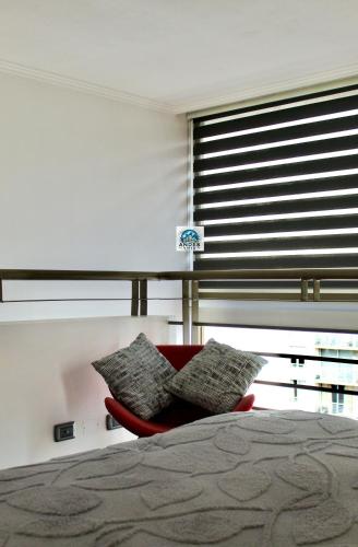 Postel nebo postele na pokoji v ubytování Loft Duplex full equipado - General Flores