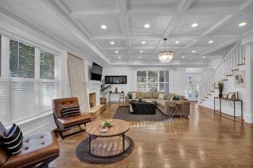 a living room with a couch and a table at Stunning 6BR Buckhead OasisPrivate BathEachRoom in Atlanta