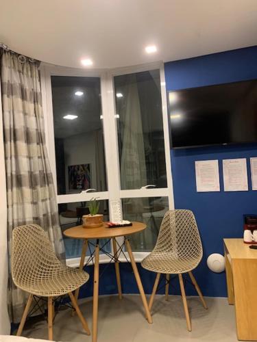 Χώρος καθιστικού στο suite deluxe vista mar Copacabana - entrada independente