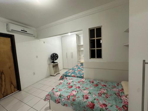 Postel nebo postele na pokoji v ubytování Excelente Casa
