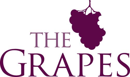 a sign that reads the greensarma with a bunch of grapes at The Grapes Pub in Southampton