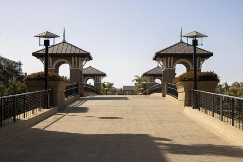 a bridge with two gazebos on top of it at Harbor View in Oxnard
