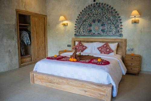 Cama o camas de una habitación en Ubud Paras Ayu Villa