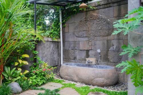 Jardín al aire libre en Ubud Paras Ayu Villa