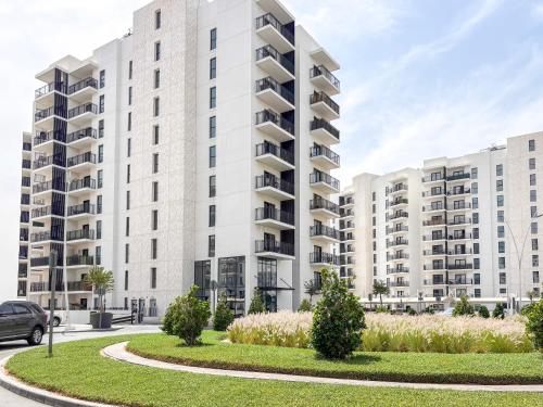 an image of an apartment building at DVH Luxe Retreats 1BR Yas Island by Ferrari World and Yas Mall in Yas Island