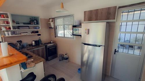 Dapur atau dapur kecil di Casa de playa disfrutable en invierno y verano