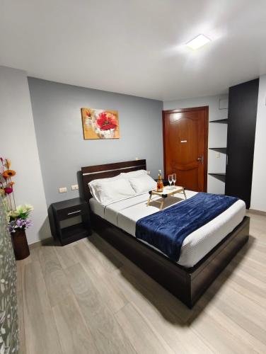 Ένα ή περισσότερα κρεβάτια σε δωμάτιο στο Zamora Suite GM Luxury