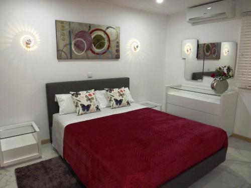 Ένα ή περισσότερα κρεβάτια σε δωμάτιο στο Fantastic Apartment On The Beach