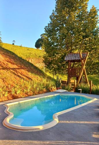 Kolam renang di atau dekat dengan Recanto Paraíso da Colina