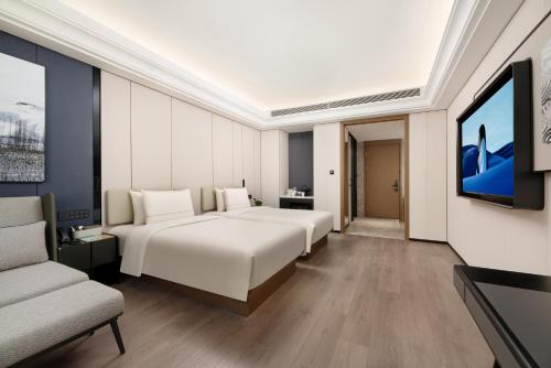 TV a/nebo společenská místnost v ubytování Atour Hotel Xi'an Jiaotong University Changle Park Subway Station