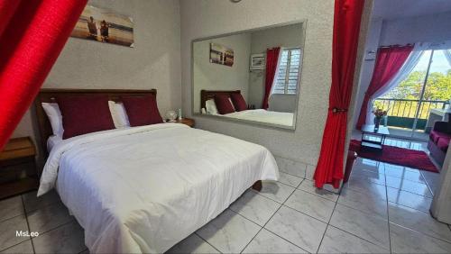 Ένα ή περισσότερα κρεβάτια σε δωμάτιο στο Froude Apartments