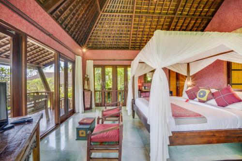 Postel nebo postele na pokoji v ubytování Awan Putih Resort