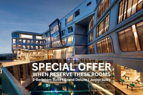 a building with a sign that reads special offer when reserve these rooms at The Oceanic Sportel Phuket - SHA Extra Plus in Phuket Town