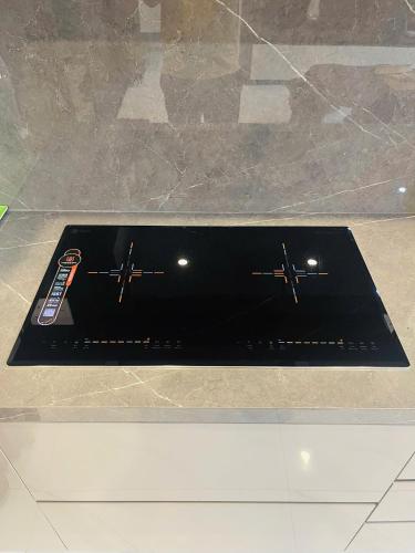 a black mat sitting on top of a counter at Subin Homestay Hue in Thôn Kim Long (1)