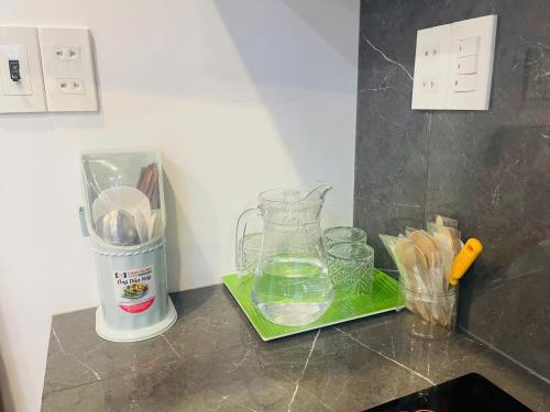 a blender sitting on a counter with some food in it at Subin Homestay Hue in Thôn Kim Long (1)