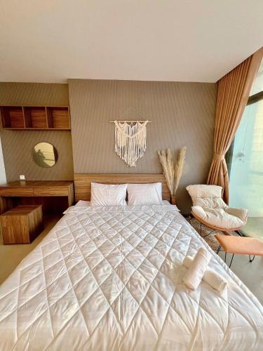 Una cama o camas en una habitación de CSJ TOWER - CSJ Apartment Luxury SeaView Vung Tau City - Căn Hộ Du Lịch Biển Vũng Tàu