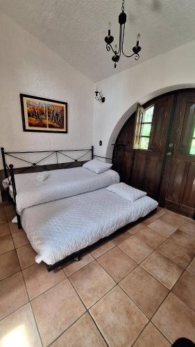 Postel nebo postele na pokoji v ubytování Finca Ana Isabel