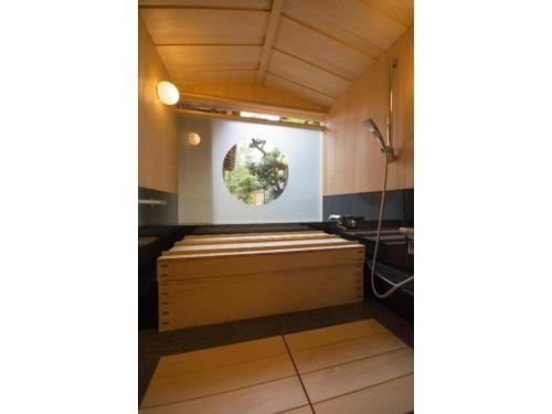 a small room with a window in a kitchen at Jeugiya - Vacation STAY 87441v in Kyoto