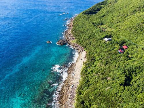 an aerial view of the ocean and a beach at Hide A Way - Vacation STAY 90104v in Nishinoomote