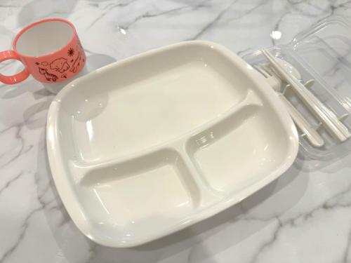 a white ashtray sitting on a counter with a cup at Grandioso Okinawa Villa Kin 2 - Vacation STAY 08755v in Yaka