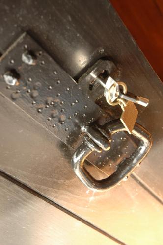 a close up of a suitcase with a tag on it at Casa da Cerejinha in Góis