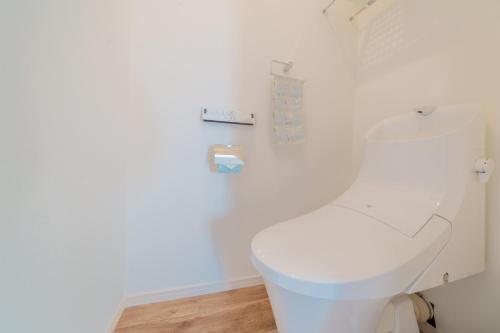 a bathroom with a white toilet in a room at Ryushima Ocean View Besso - Vacation STAY 13427 in Minamiboso