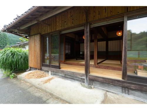a building with glass windows on the side of it at Shikouan - Vacation STAY 55494v in Higashi-shibuta