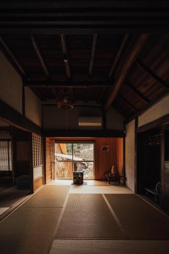 an empty room with a large window and a door at Shikouan - Vacation STAY 55494v in Higashi-shibuta