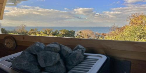 a view of the ocean from a balcony at NE-2930 - Vacation STAY 68092v in Awaji
