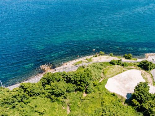 an aerial view of a road next to the ocean at NE-2930 - Vacation STAY 68092v in Awaji