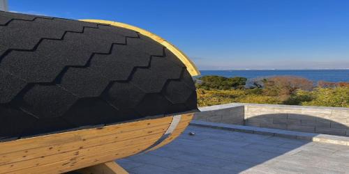 a wooden bench sitting on top of a patio at NE-2930 - Vacation STAY 68092v in Awaji
