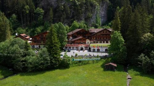 an aerial view of a resort in the mountains at Waldhotel Doldenhorn in Kandersteg