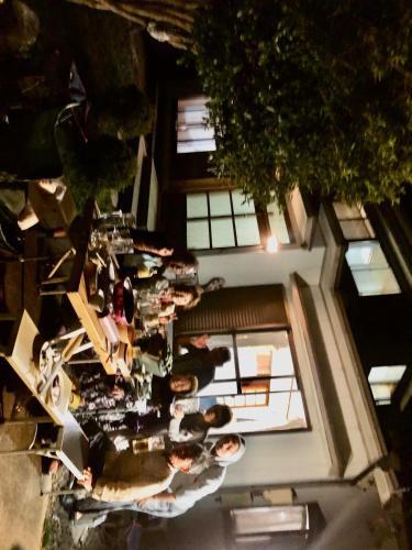 an overhead view of a group of people in a restaurant at Hotel Ryokan Togenkyo - Vacation STAY 97146v in Ise