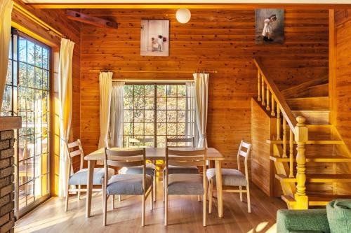 a dining room with a table and chairs at Nasu Grand Villa - Vacation STAY 13860 in Nasu-yumoto