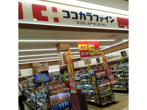 a store aisle with a grocery store with food at Minpaku Yamamoto - Vacation STAY 13870 in Izumiotsu