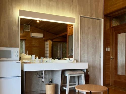 a kitchen with a large sink and a refrigerator at Inn Suenaga - Vacation STAY 25965v in Hiji