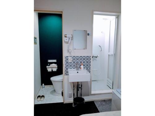a bathroom with a toilet and a sink at Tokyo stay Hut SARI - Vacation STAY 27239v in Tokyo
